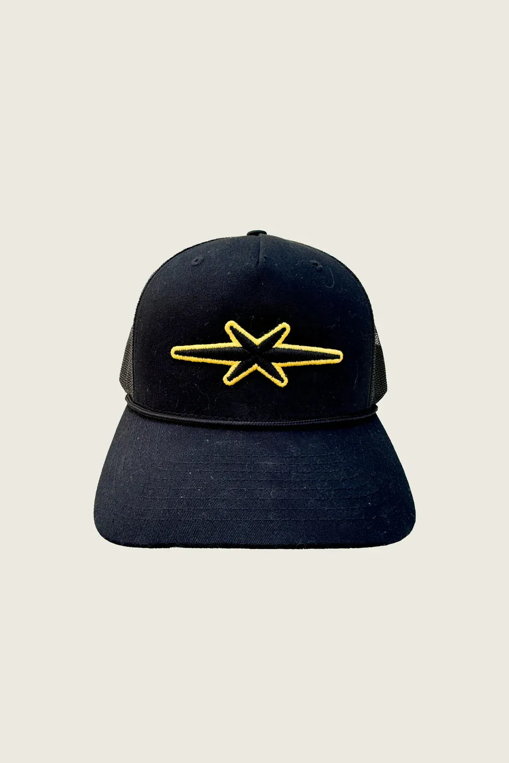 PHIPPS STAR LOGO TRUCKER CAP BLACK